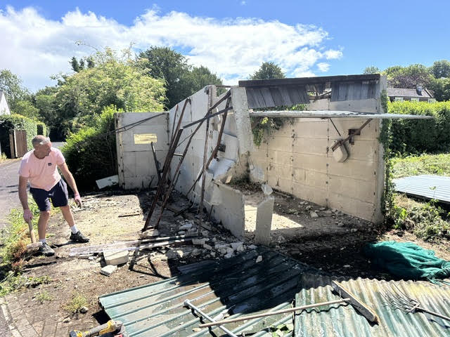 Image shows the dilapidated building being demolished before work begins